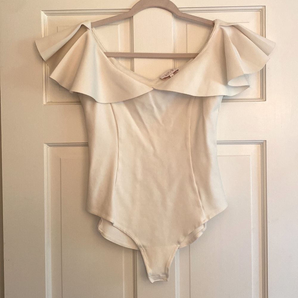 Size small creamy white body suit